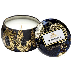 A coconut wax candle in a decorative japanese inspired tin moso bamboo voluspa